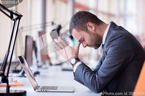 Image of frustrated young business man