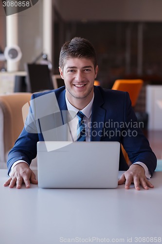 Image of business man at the office