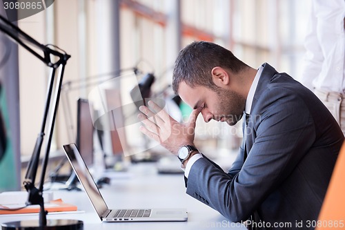 Image of frustrated young business man