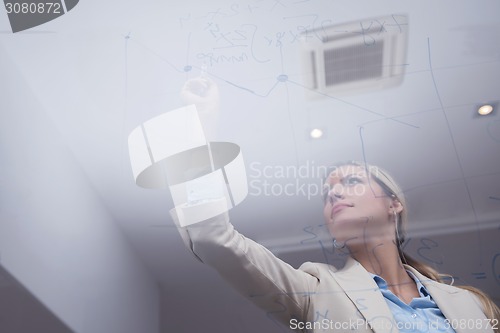 Image of business woman at office