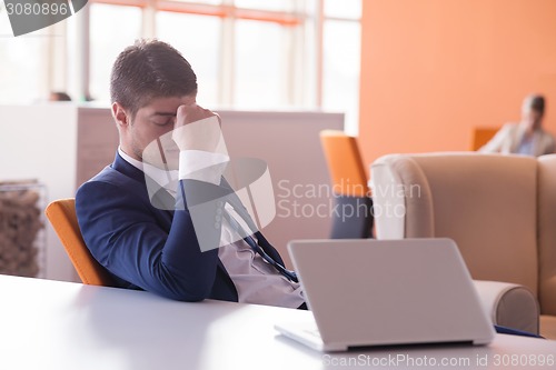 Image of frustrated young business man