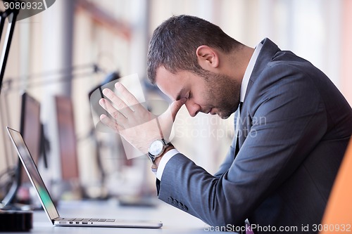 Image of frustrated young business man