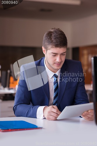 Image of business man at the office