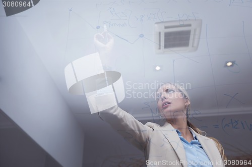 Image of business woman at office