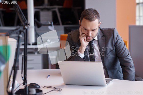 Image of frustrated young business man