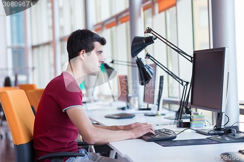 Image of business man at the office