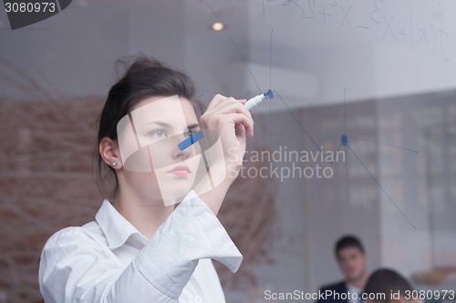Image of business woman at office