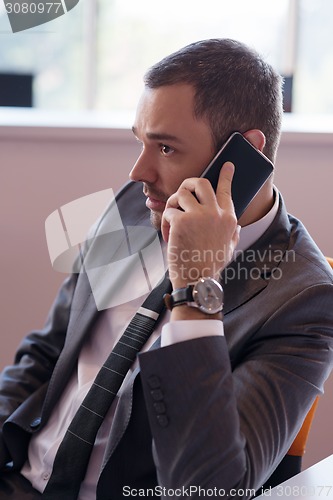 Image of business man at the office