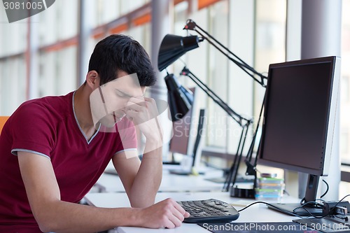 Image of frustrated young business man