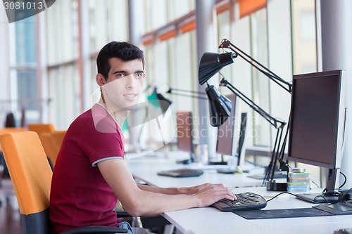 Image of business man at the office