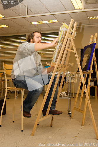 Image of young artist drawing