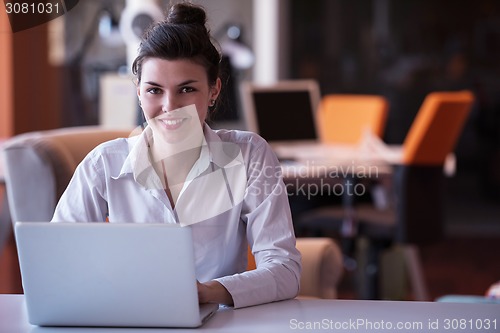 Image of business woman at office