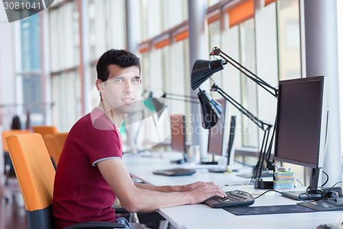 Image of business man at the office