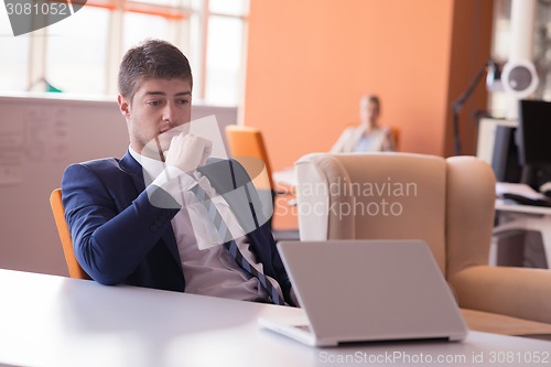 Image of business man at the office