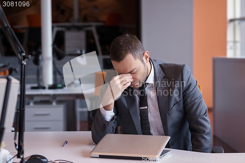 Image of frustrated young business man