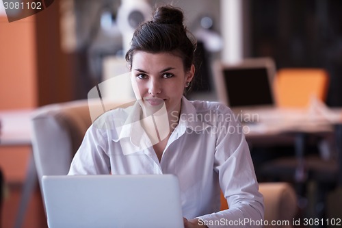 Image of business woman at office
