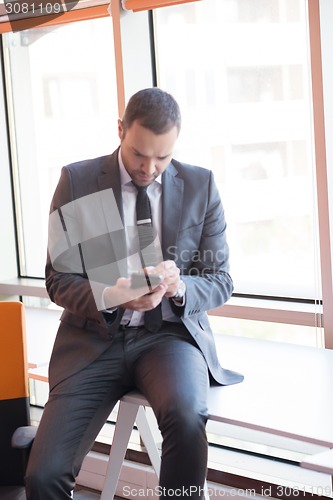 Image of business man at the office