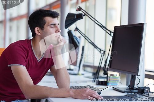 Image of business man at the office