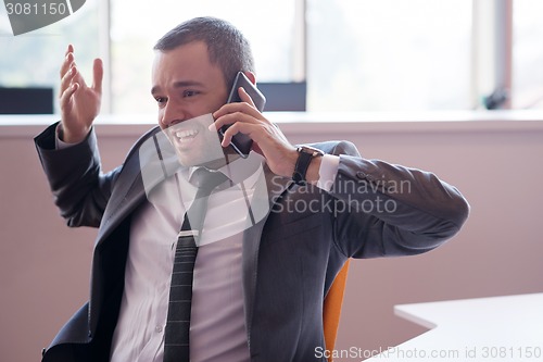 Image of business man at the office