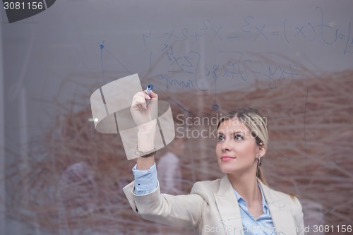 Image of business woman at office