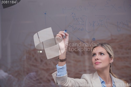Image of business woman at office