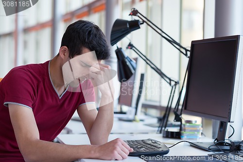 Image of frustrated young business man