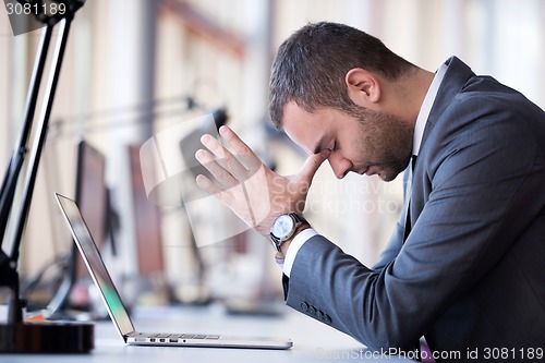 Image of frustrated young business man