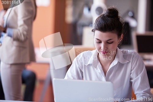 Image of business woman at office