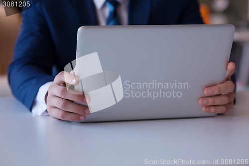 Image of business man at the office
