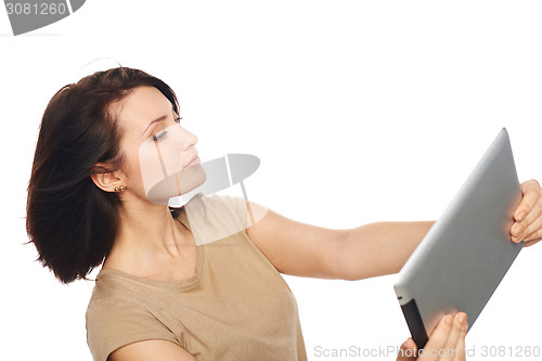 Image of Female taking selfie with digital tablet