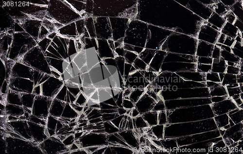 Image of Full screen broken glass, black background 