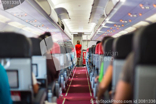 Image of Stewardess on the airplane.