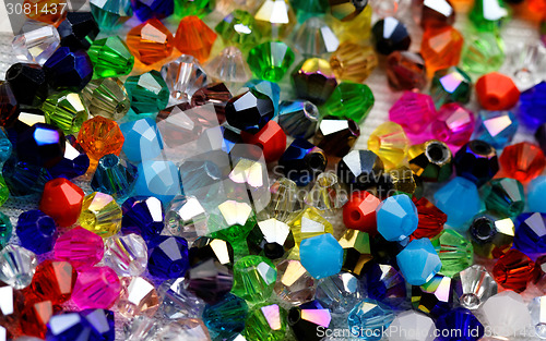 Image of Beautiful glass beads closeup on white background