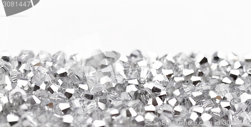 Image of Beautiful glass beads closeup on white background