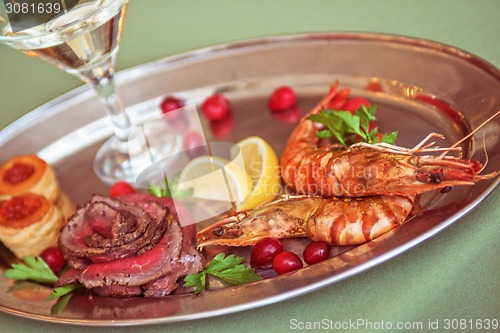 Image of Grilled shrimps and beef meat 
