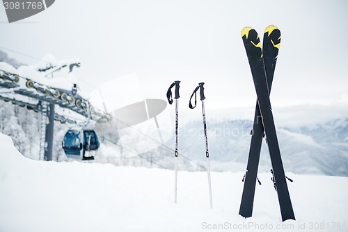 Image of Ski equipment in the snow
