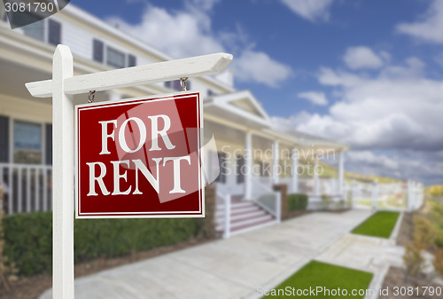 Image of For Rent Real Estate Sign in Front of House