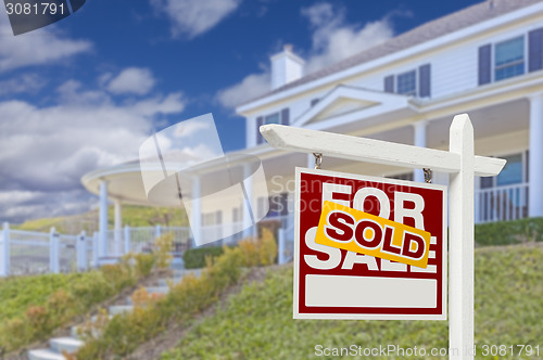 Image of Sold Home For Sale Real Estate Sign and House