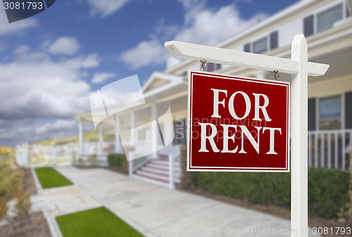 Image of For Rent Real Estate Sign in Front of House