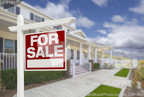 Image of Home For Sale Real Estate Sign and House