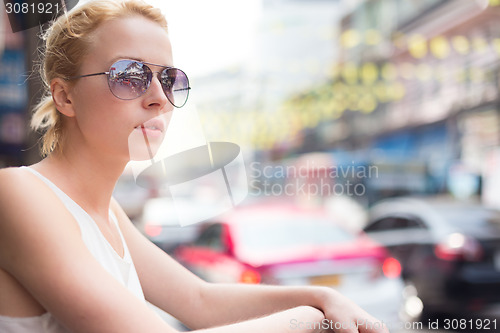 Image of Stylish Female Traveler in Bangkok.