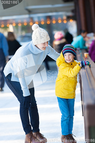 Image of family ice skating