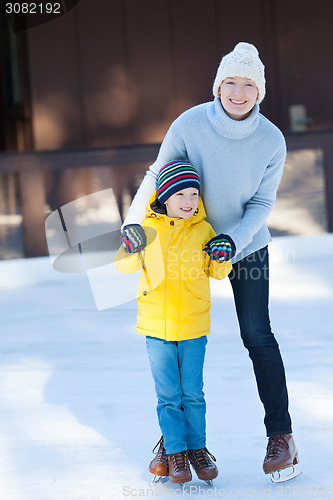Image of family ice skating