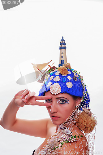 Image of Woman wearing a nautical themed headdress