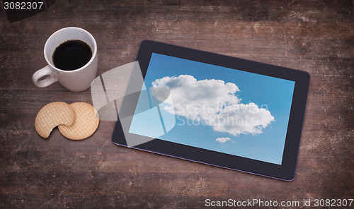 Image of Cloud-computing connection on a digital tablet pc