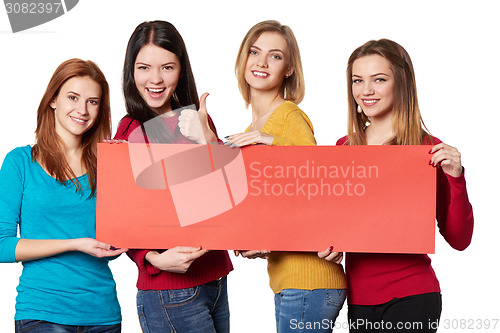 Image of Young people with banner