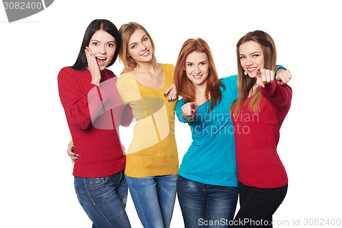 Image of Young people with thumbs up