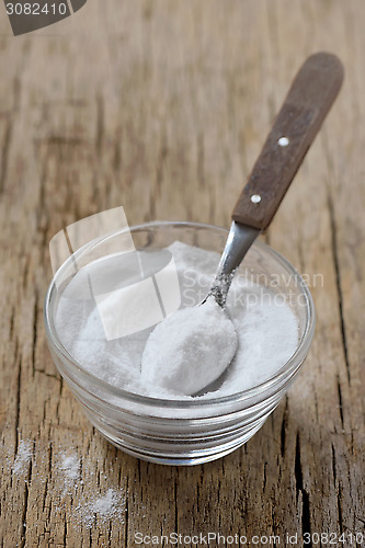 Image of Spoon of baking soda in bowl of baking soda