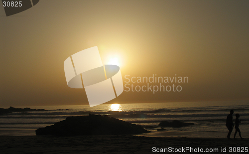Image of Walking on a sunset