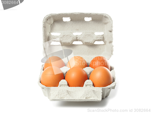 Image of Container with eggs on white